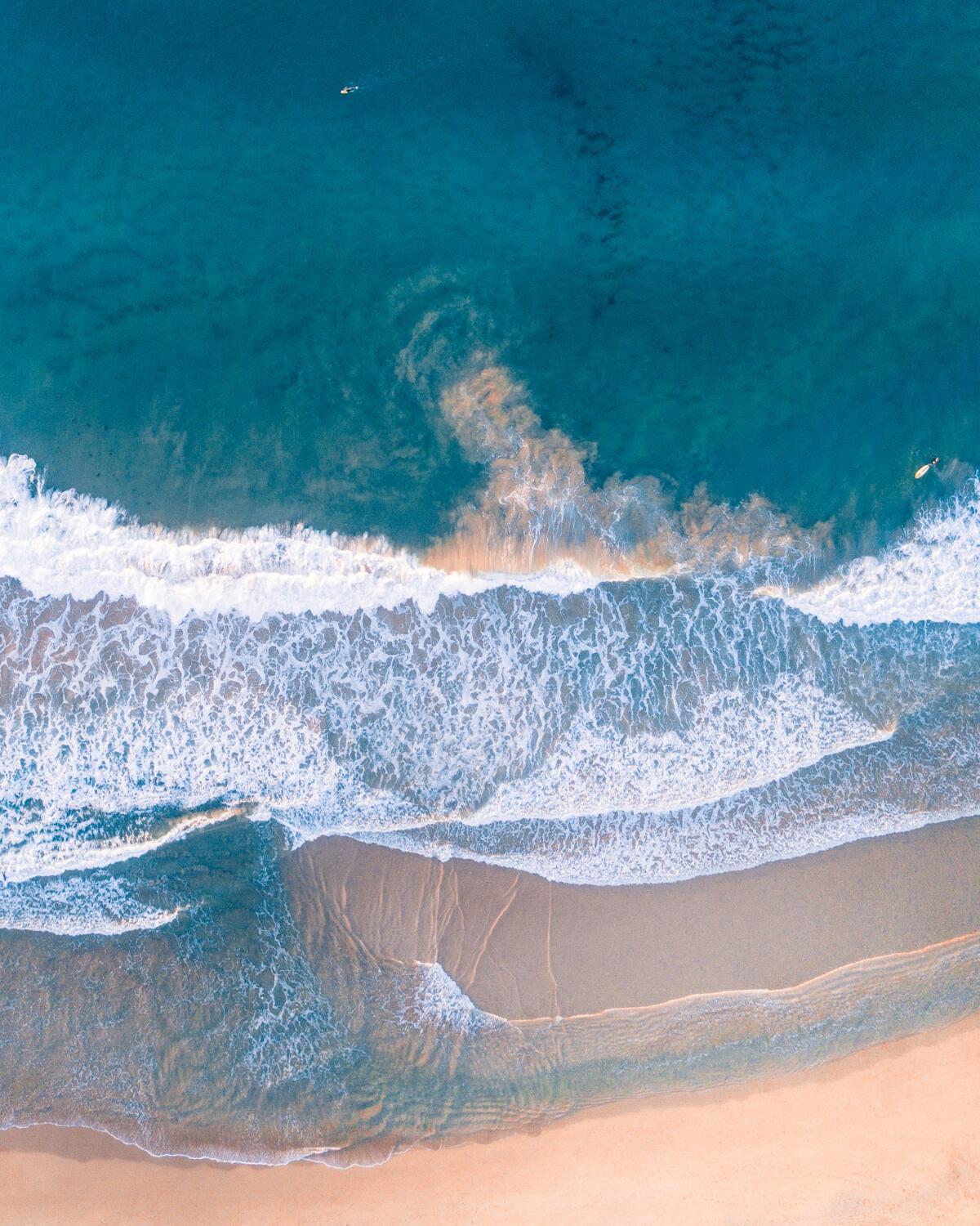 Waves on the shore seen from above