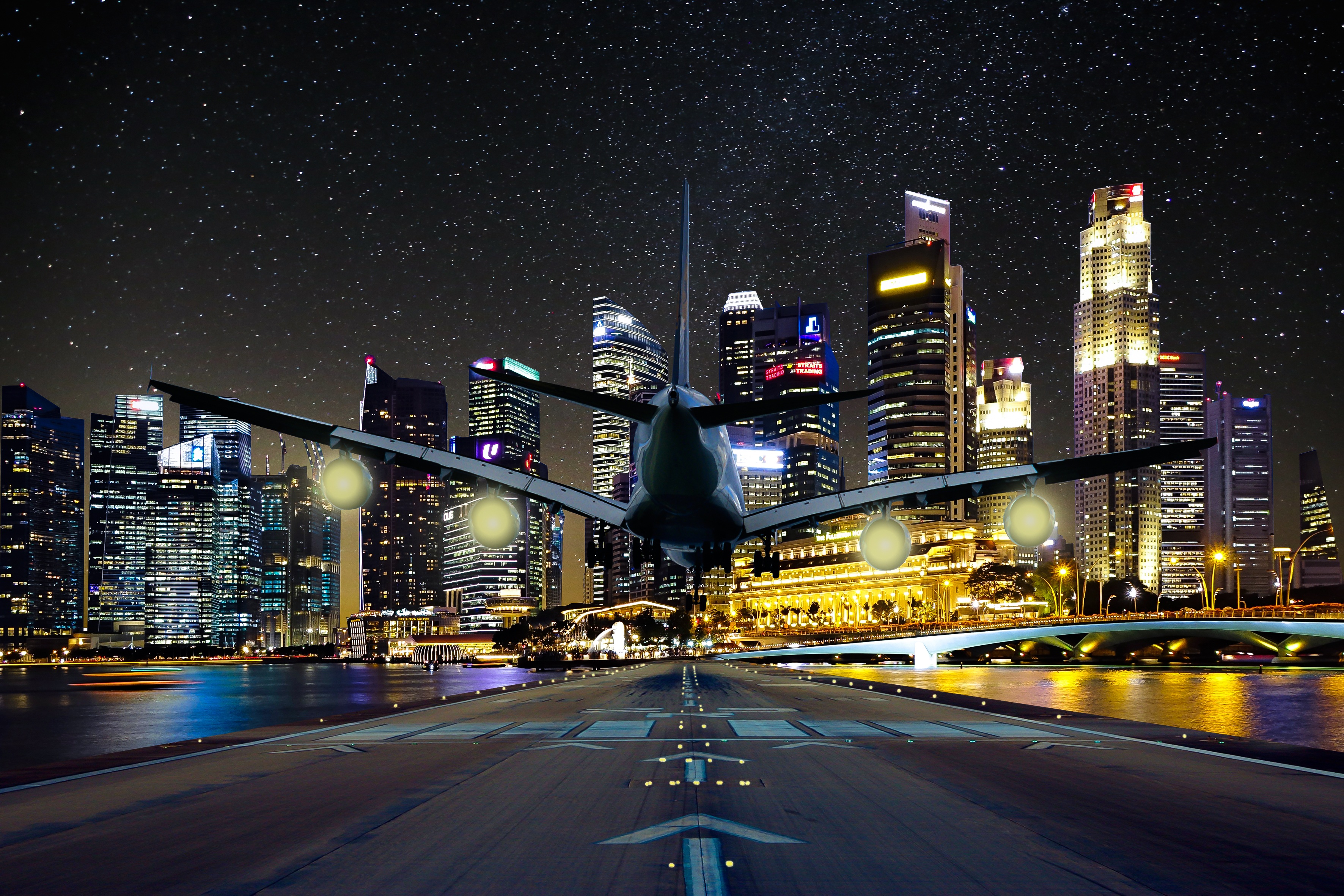 Бесплатное фото Посадка самолета в ночном городе