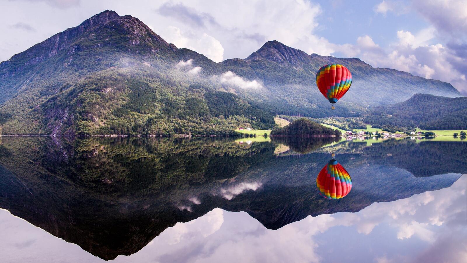 Free photo A hot air balloon ride over the river
