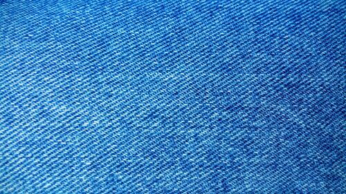 Голубая джинсовая ткань крупным планом