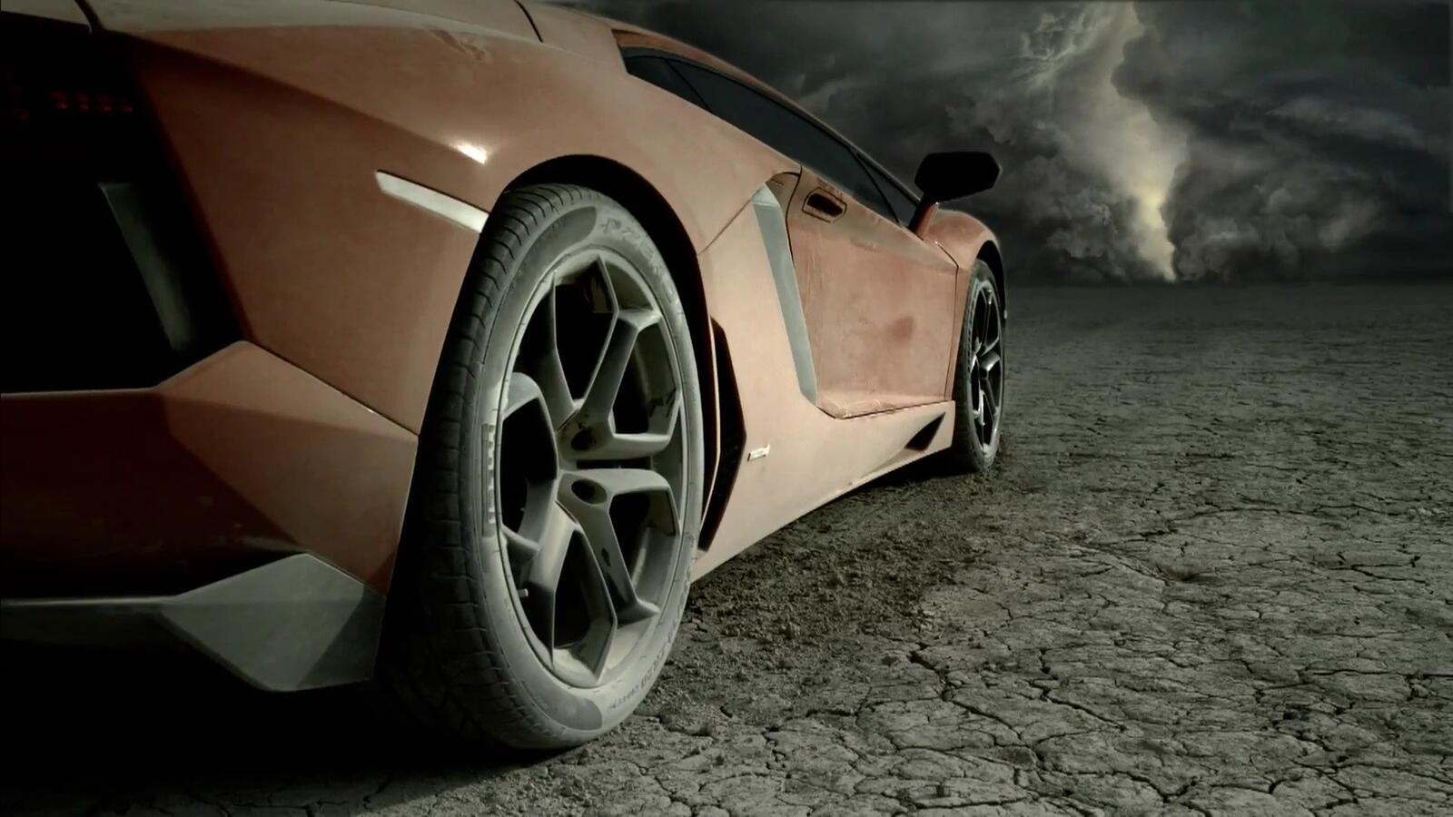 Free photo A desktop picture of a dusty Lamborghini.