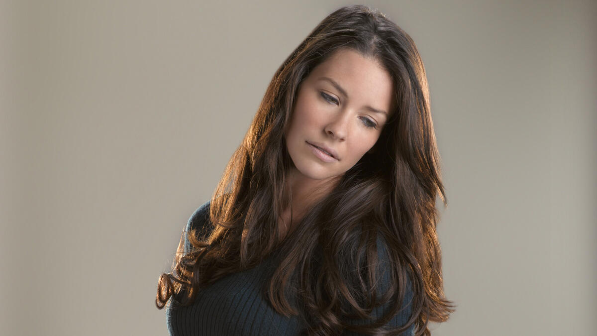 Evangeline Lilly on a simple background