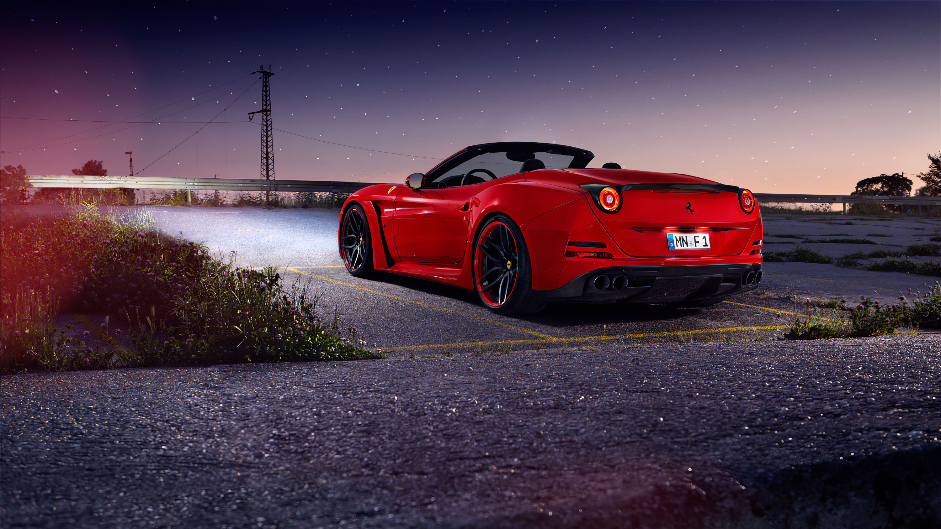 Free photo Wallpaper with red Ferrari on the track