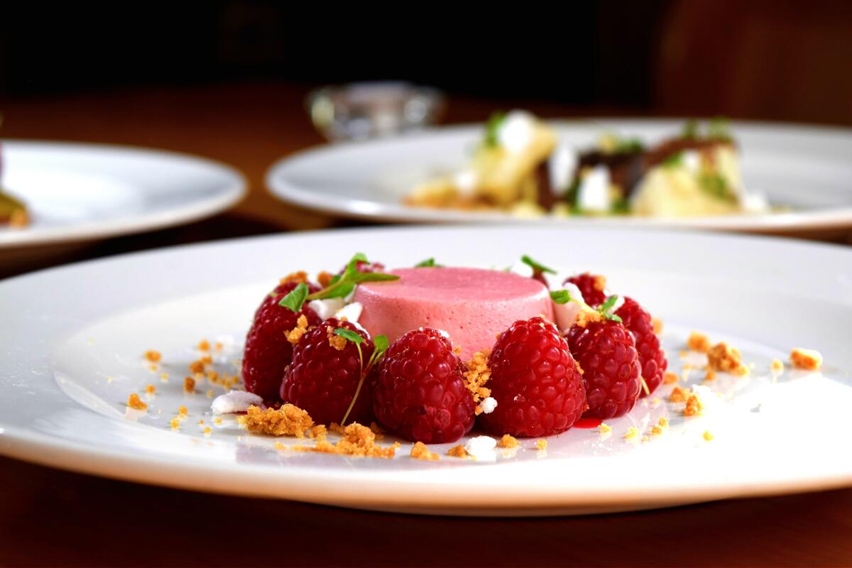 Raspberry dessert on a white plate