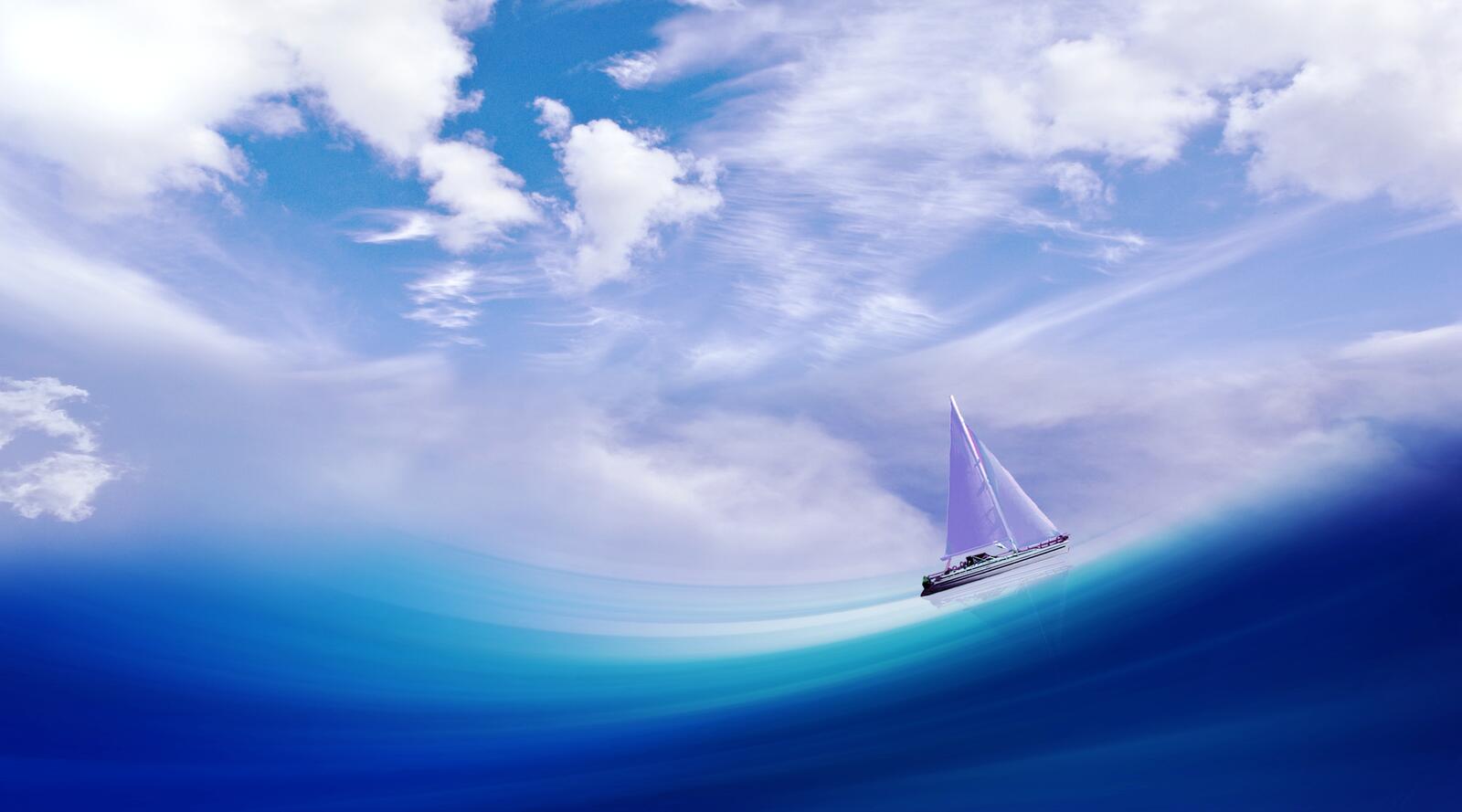 Free photo A sailboat sails the waves