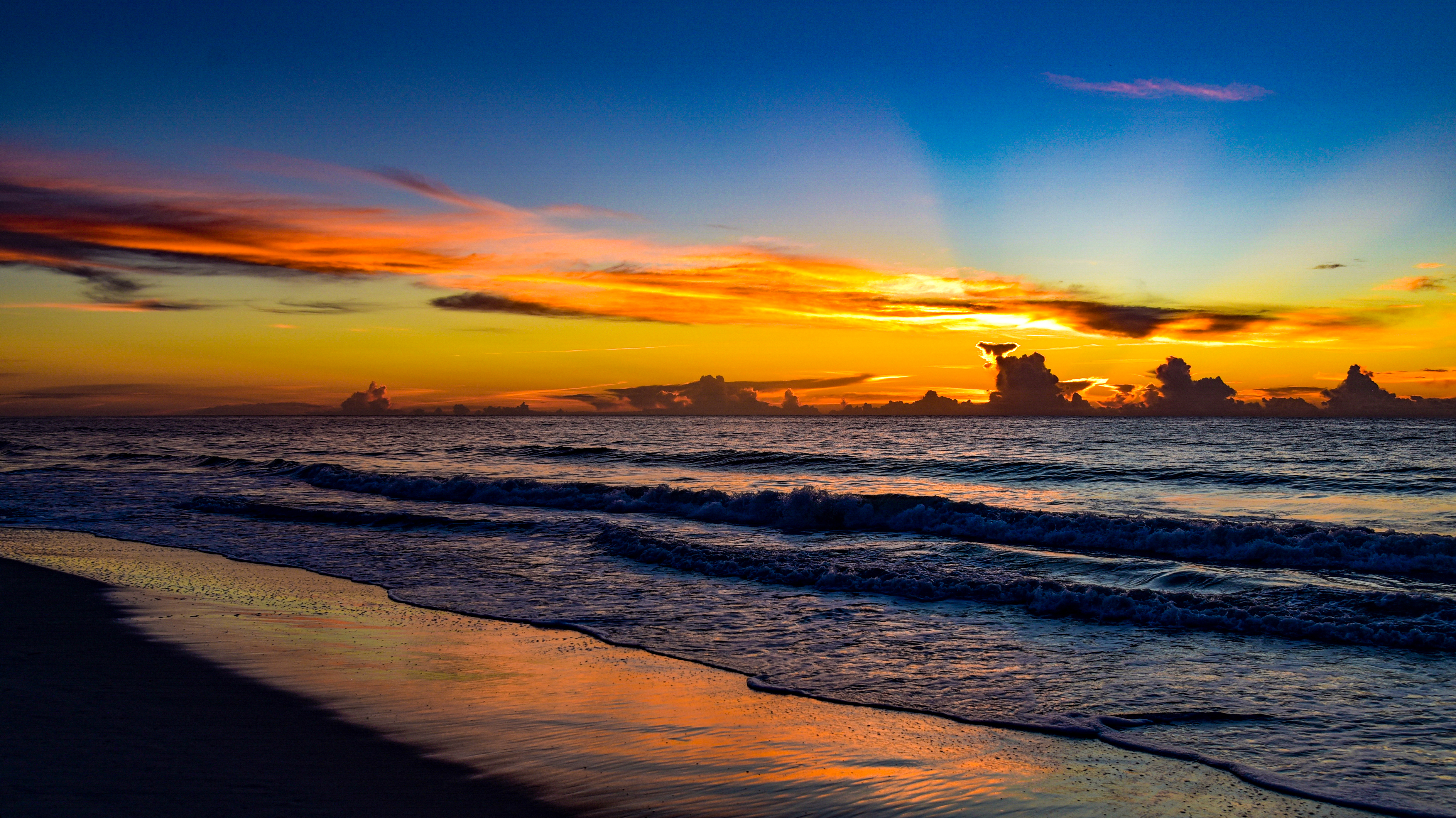 免费照片海边的晚间夕阳