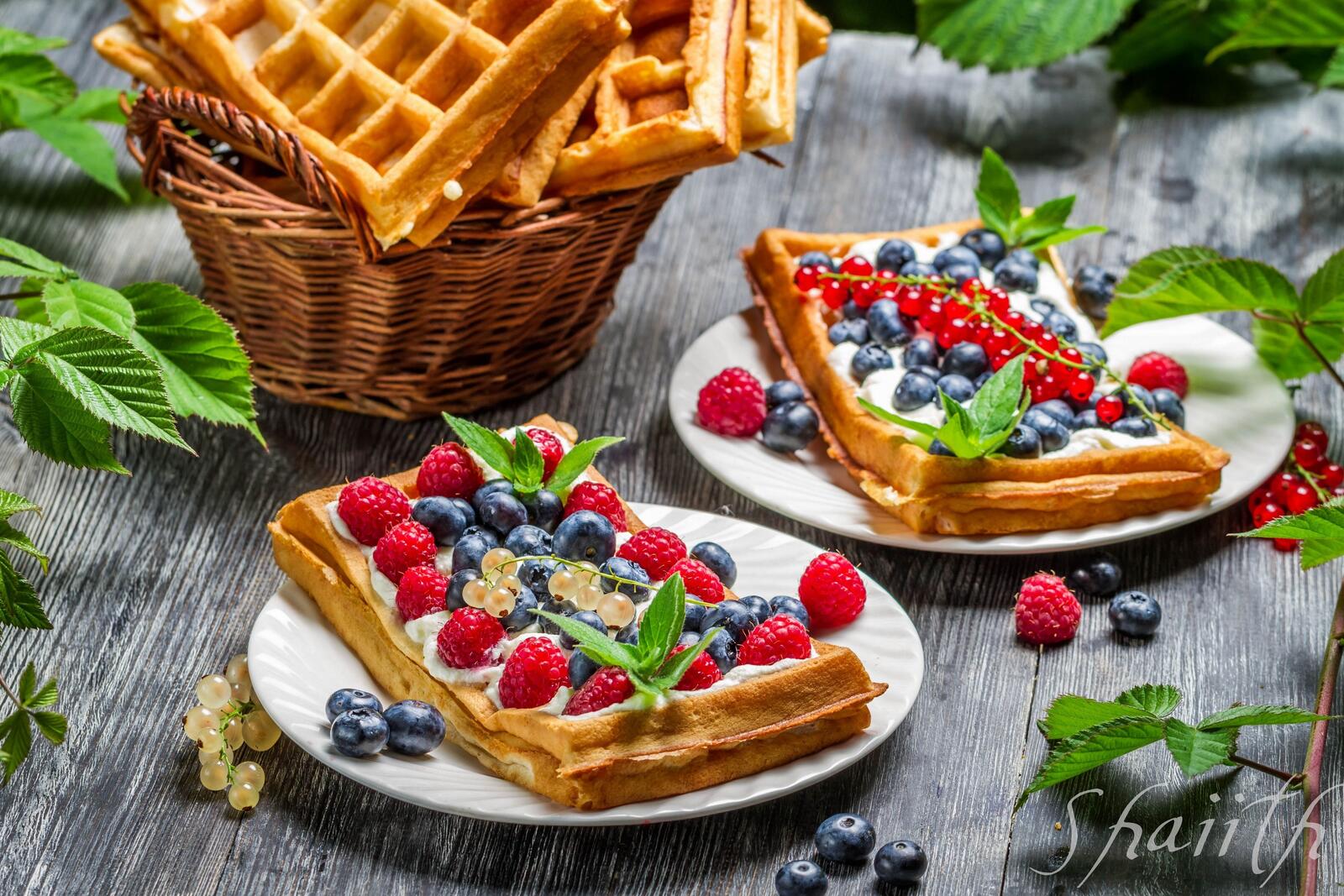 Free photo Waffle cookies with wild berries.