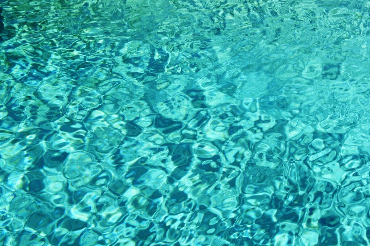 Sunbeams in a blue pool
