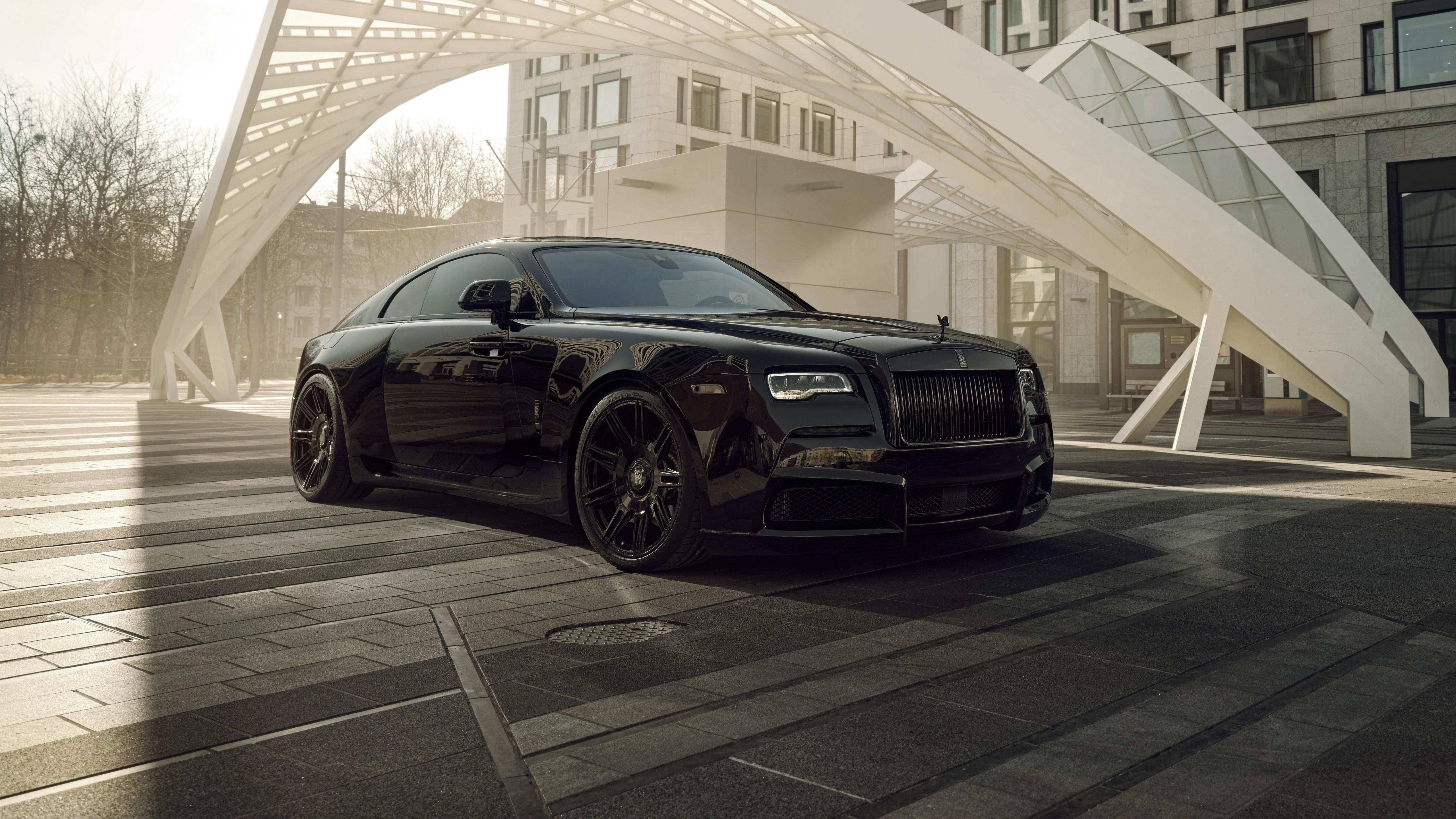 A brutal Rolls Royce Wraith in black.