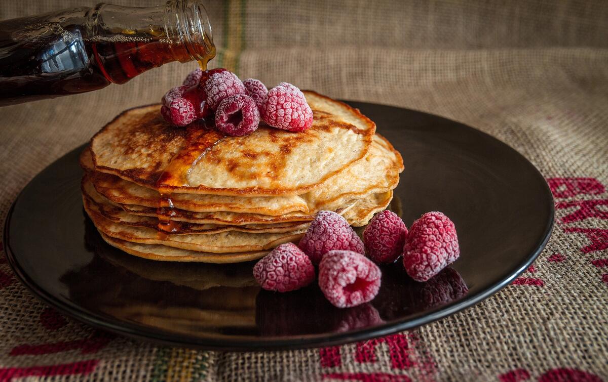 Frozen raspberries with pancakes