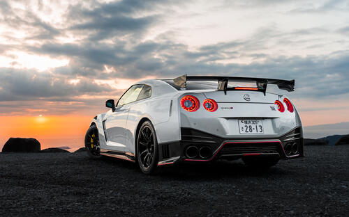 Nissan GTR rear view at sunset