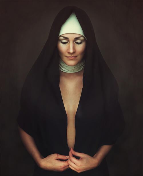 A nun gets naked on camera