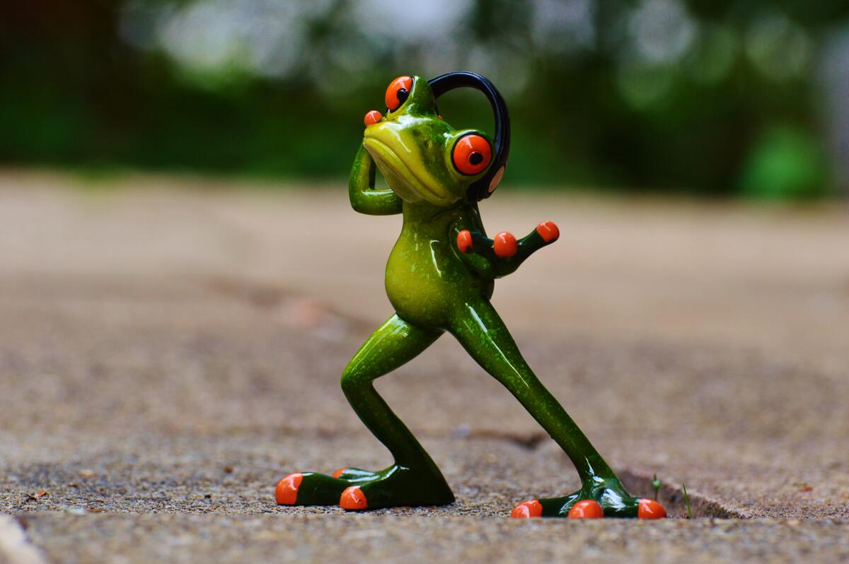 Dancing frog made of porcelain