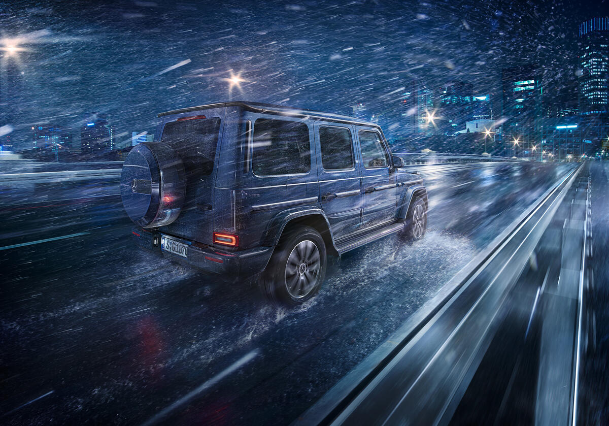 Mercedes-Benz G-Class driving at night in rainy weather