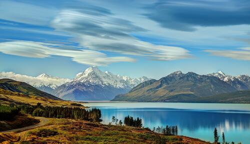 A beautiful landscape with mountains and a river in New Zealand