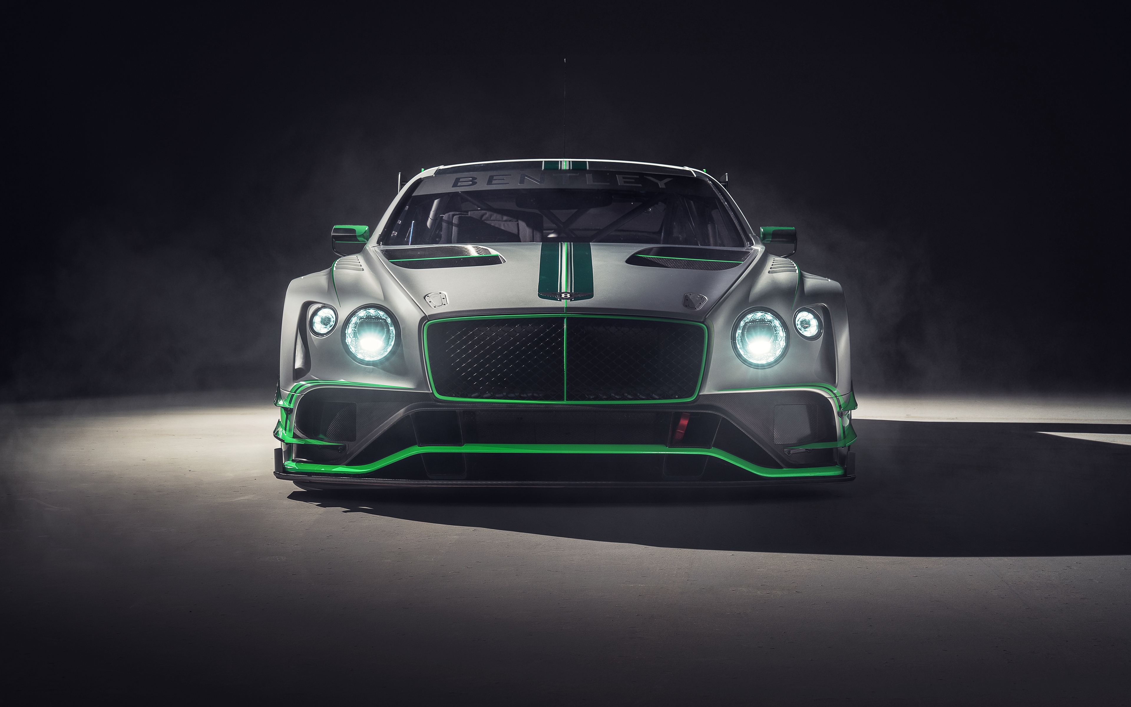 Gray bentley continental gt3 with green inserts