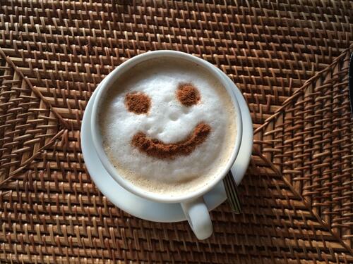 Smiley face on coffee foam
