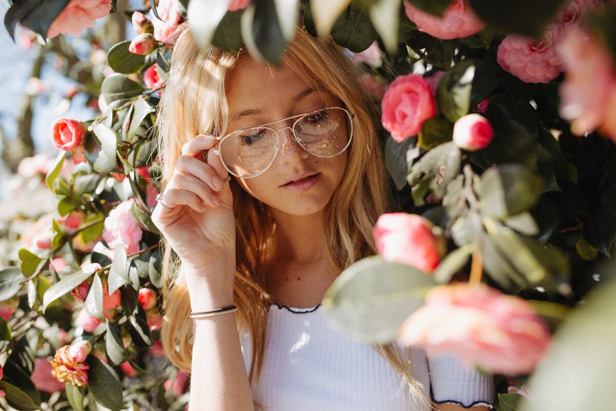Blonde-haired girl with see-through glasses