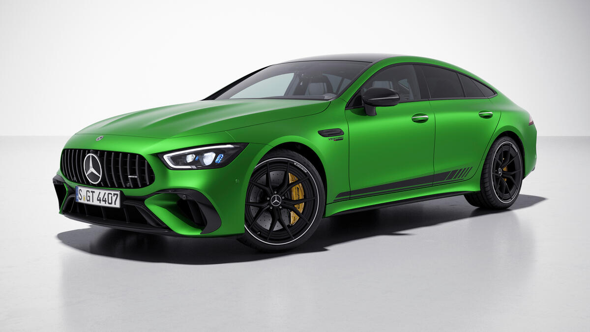 Bright green Mercedes-AMG GT 4-Door Coupe on white background