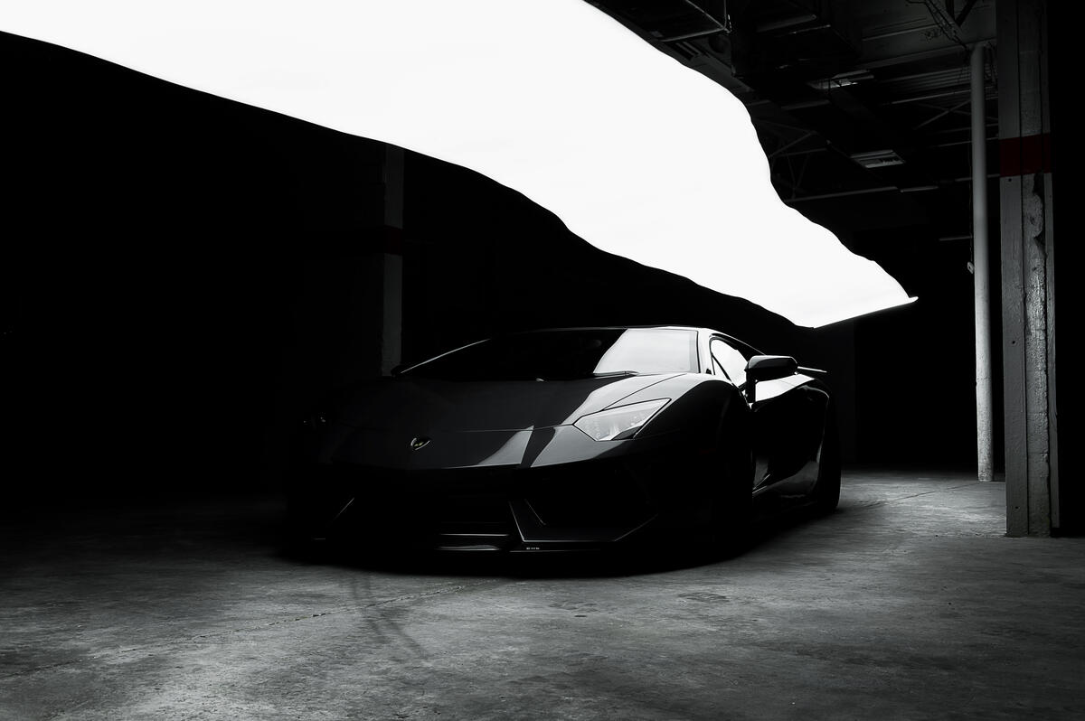 Black 2021 Lamborghini Aventador in the shade