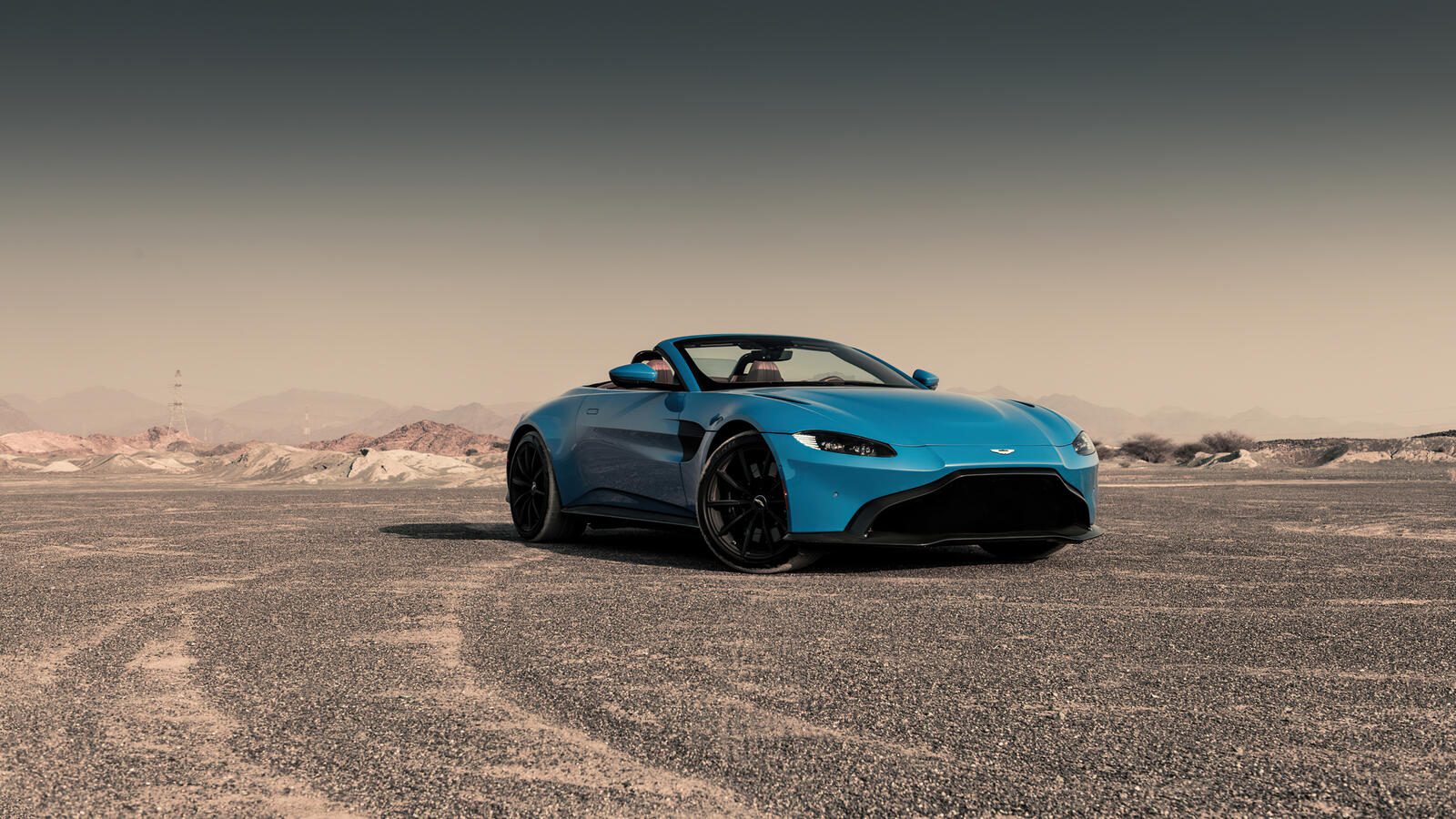 Обои Aston Martin Vantage голубой Aston Martin на рабочий стол