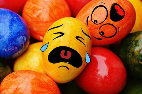 Painted eggs with funny faces for Easter