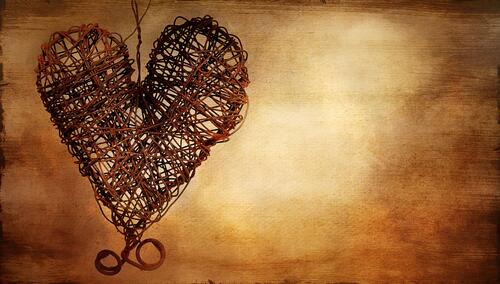 A crocheted heart made of rusty wire