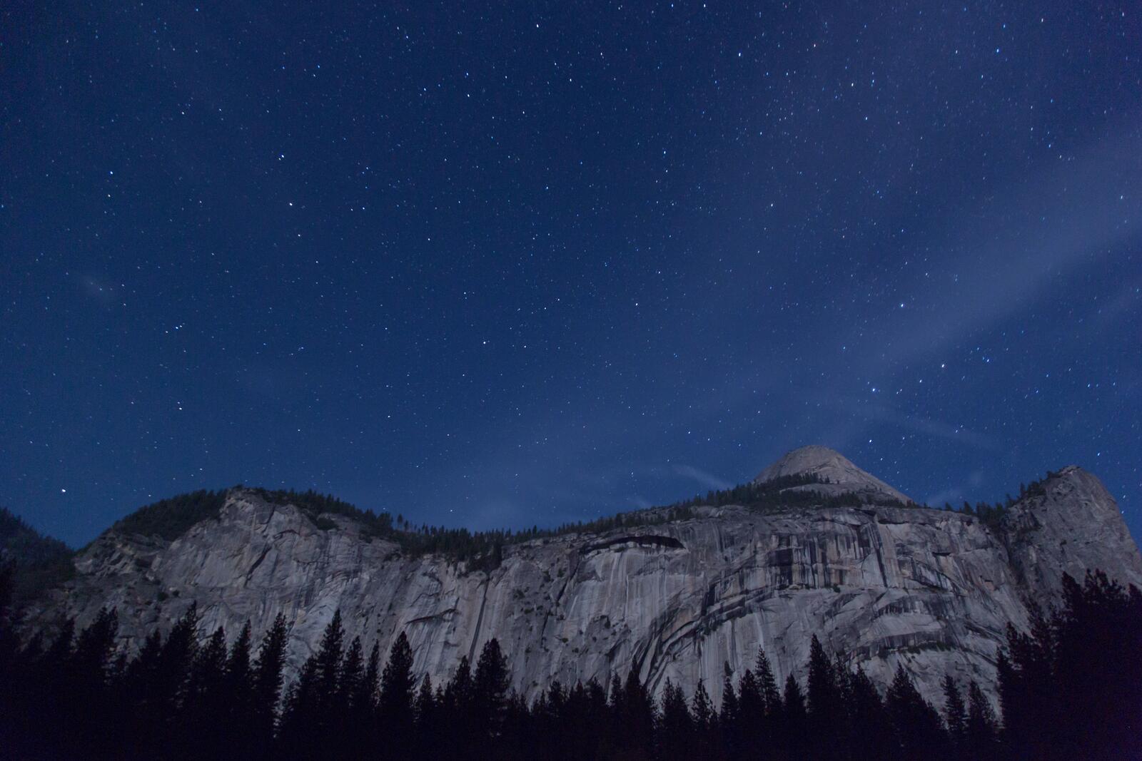 Free photo Starry sky over the mountain