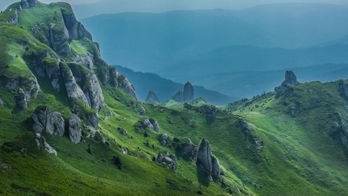 Green hills with sharp rocks