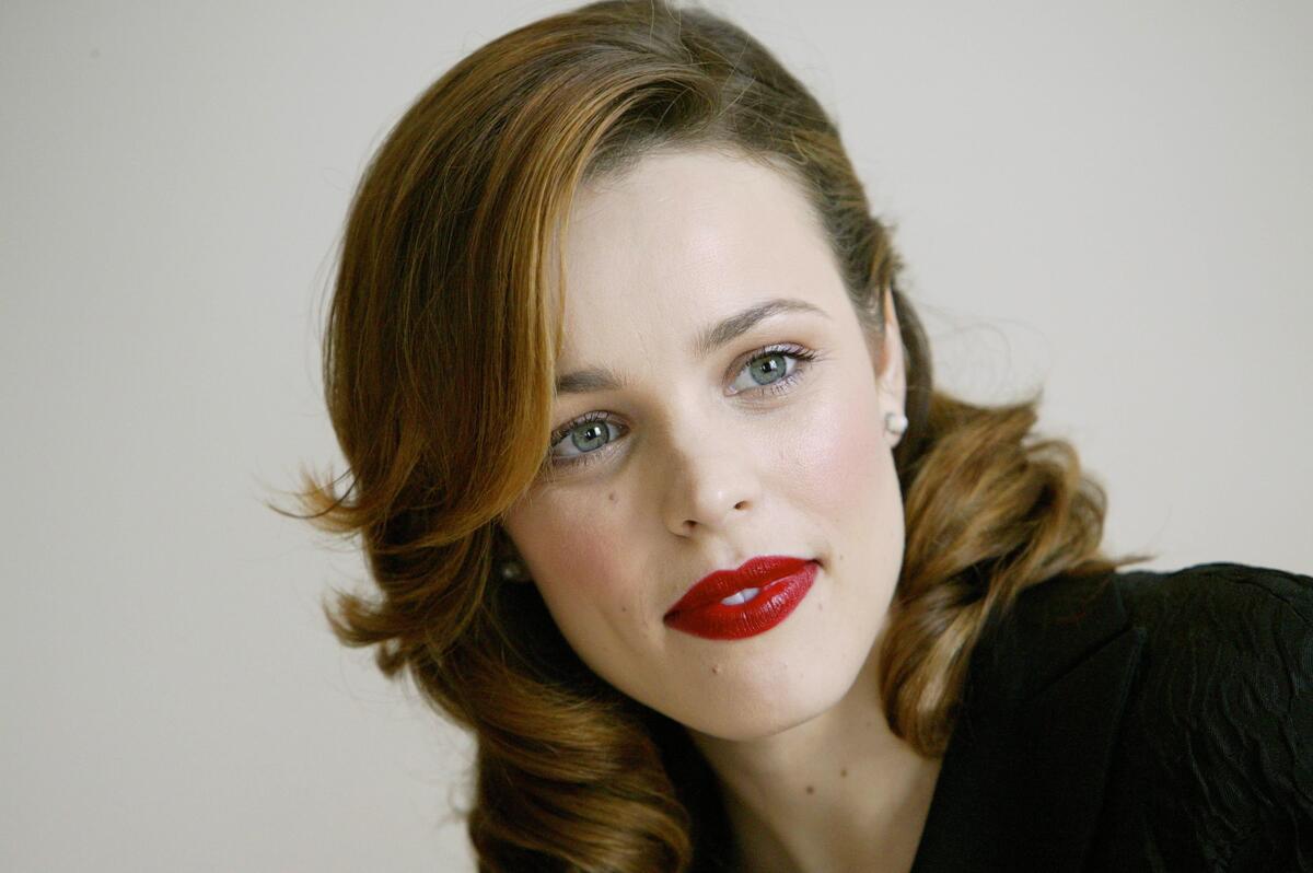 Rachel McAdams with red hair and red lipstick on her lips