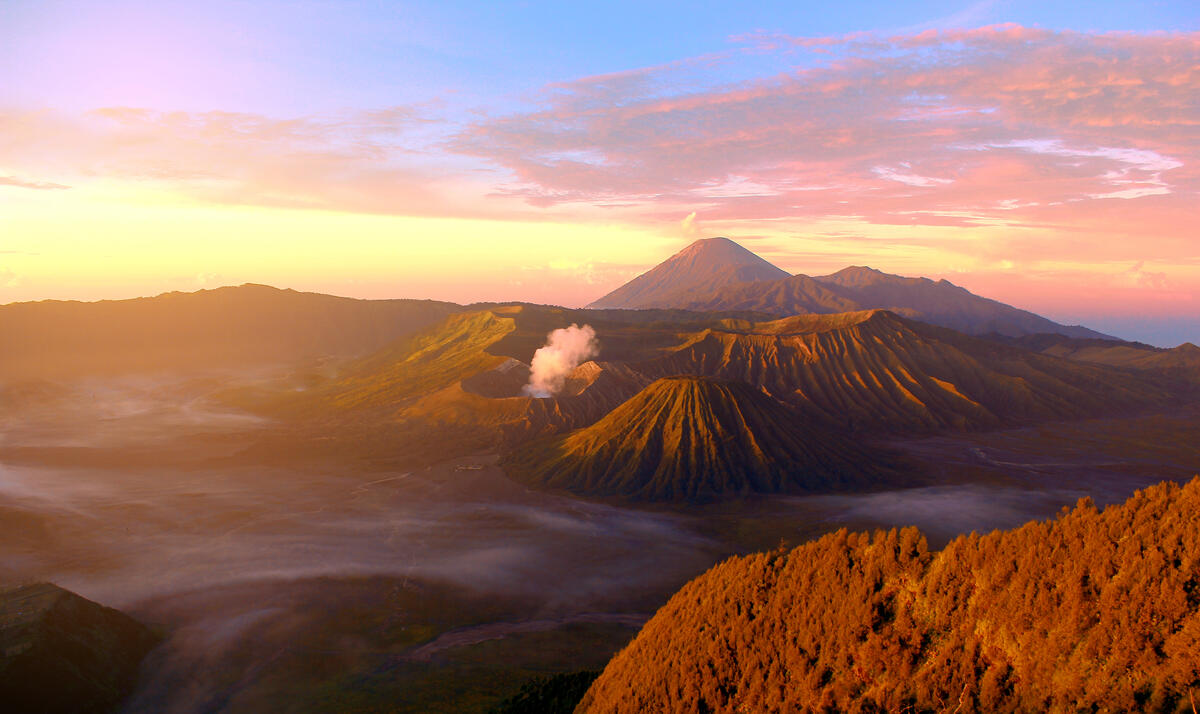A volcanic landform at sunset