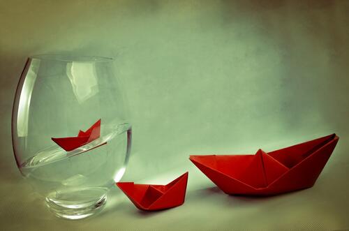 Paper ships made of red paper