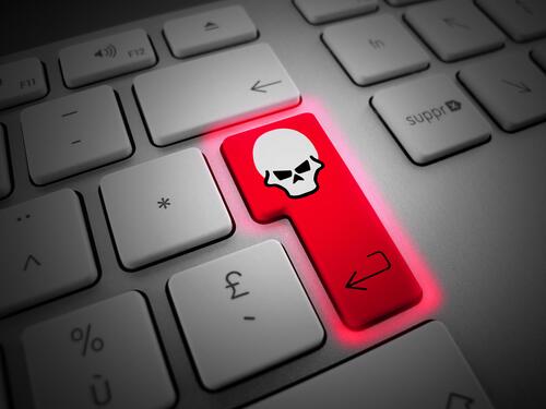 The red button with the skull on the computer keyboard