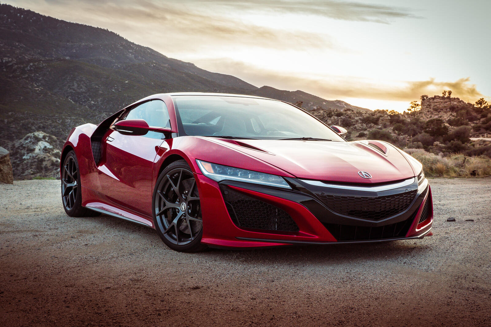 Free photo Red Acura in a sports car on black rims
