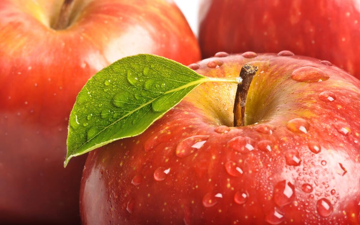 Red apples with water droplets