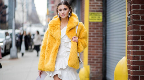 Stephanie Giesinger in yellow fur coat