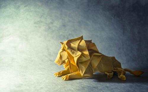 Origami lion from yellow paper