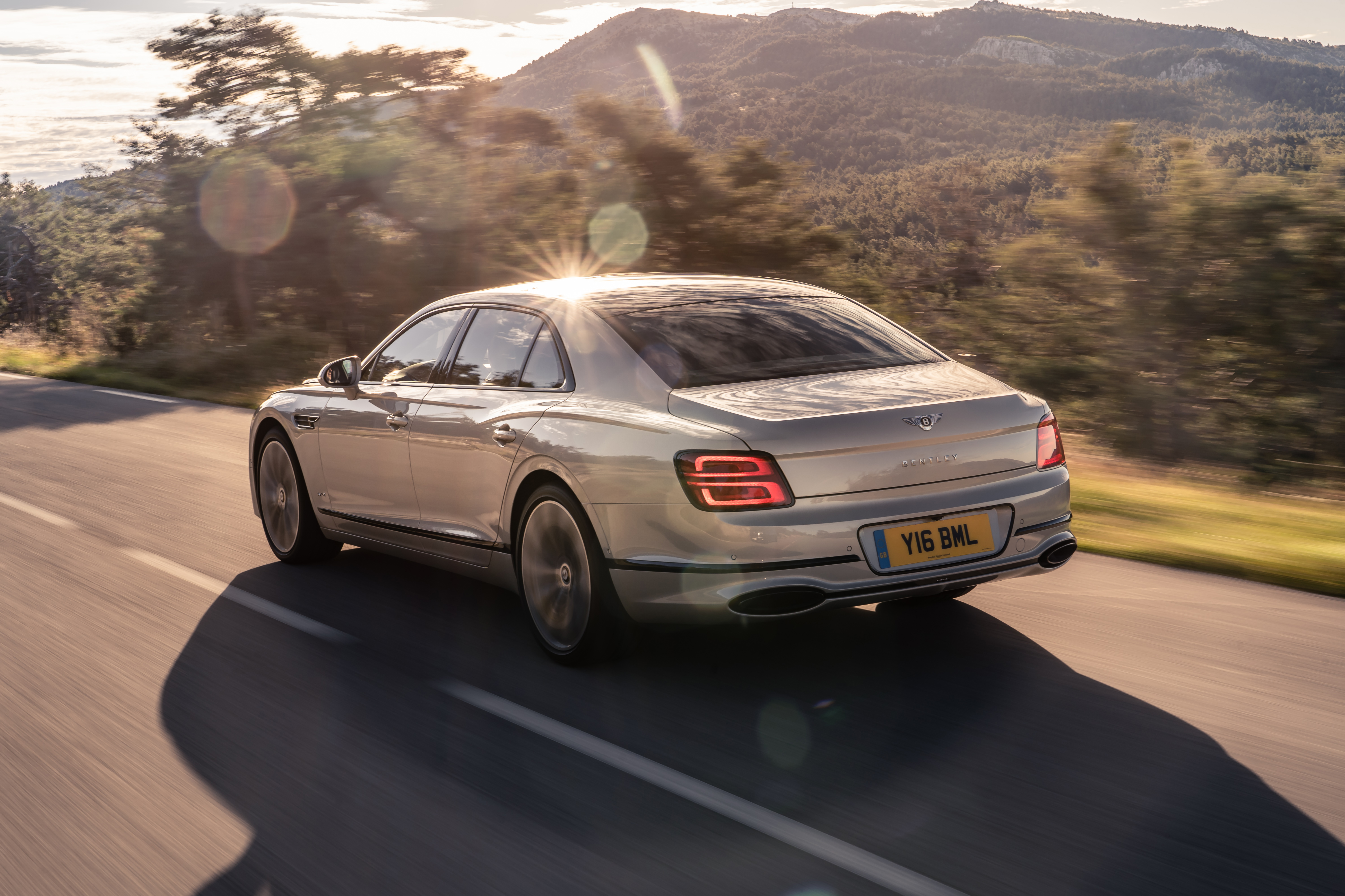 Free photo 2020 Bentley Flying Spur silver color rear view