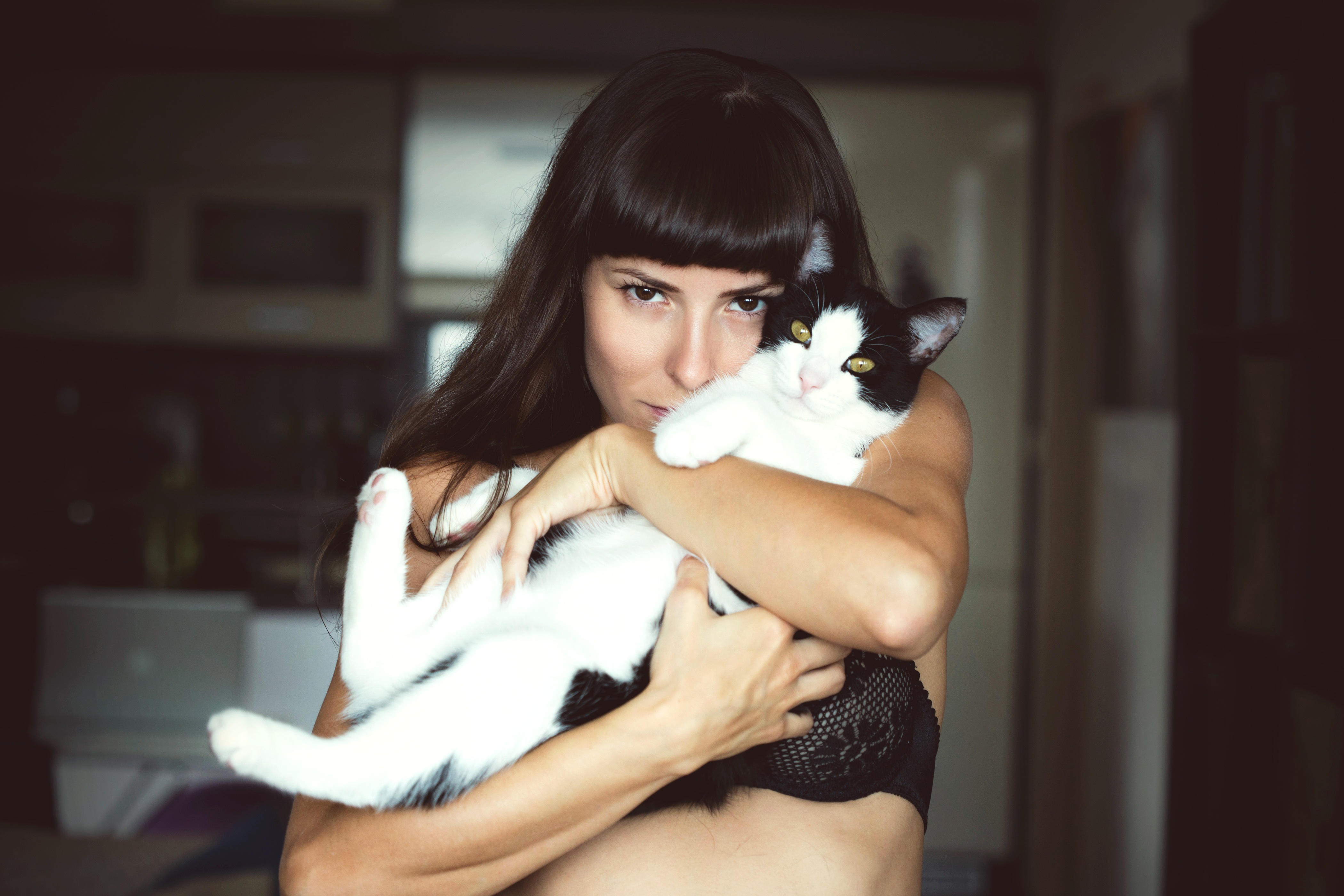 Beautiful brunette photographed with her pet