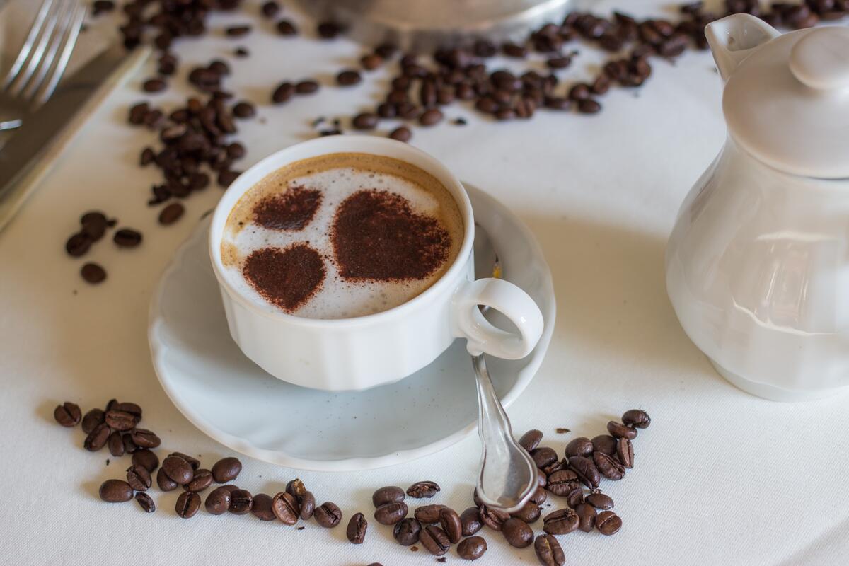 Chocolate hearts on coffee foam
