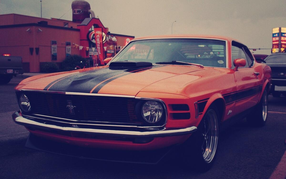 Boss 302 Mustang in orange.