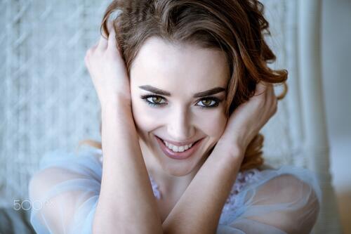 Galina Tsivina smiles playfully at the photographer