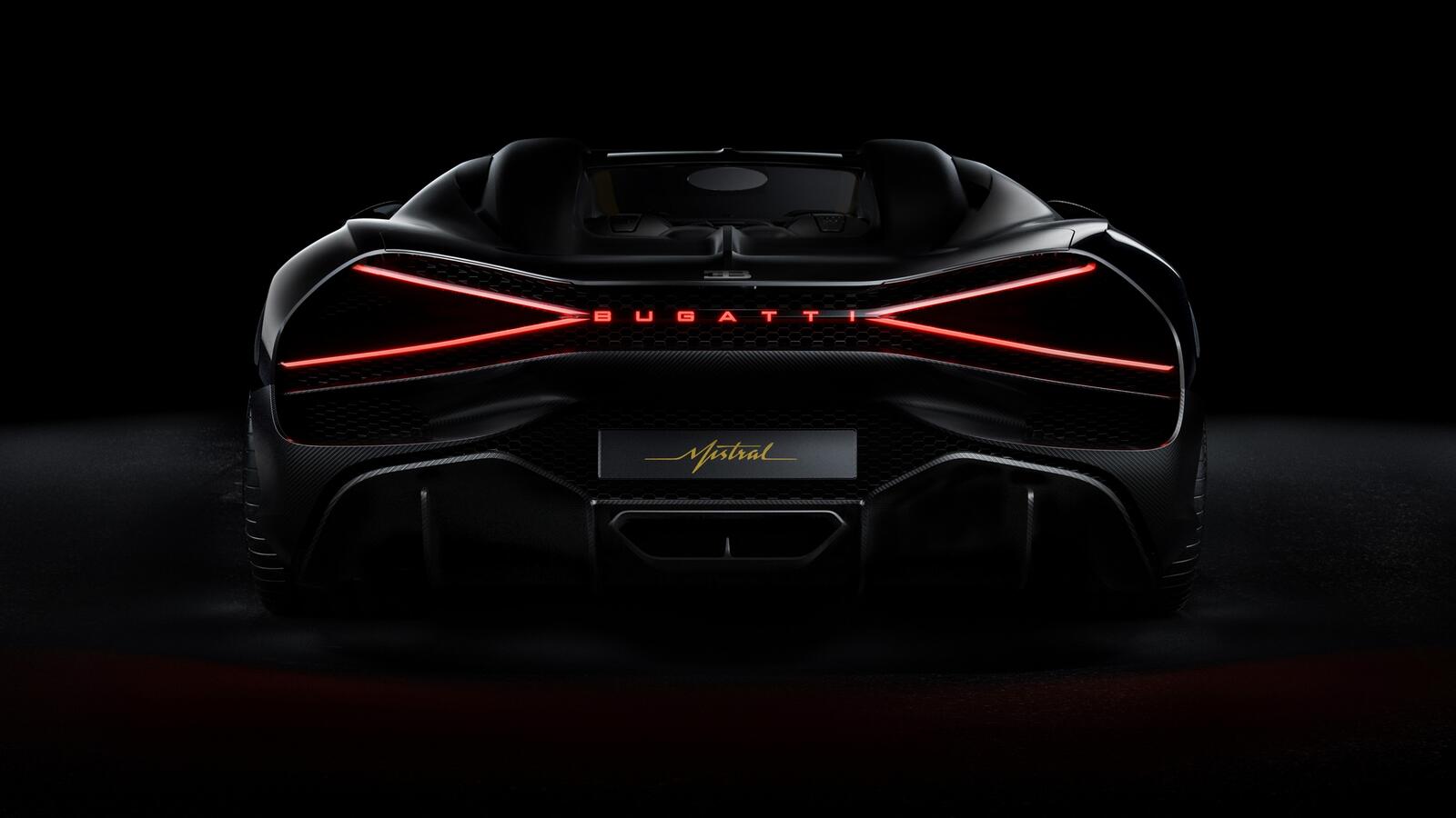 Бесплатное фото Задняя оптика Bugatti W16 Mistral 2024 года в темном помещении