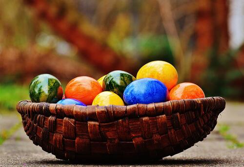 A basket of colored eggs