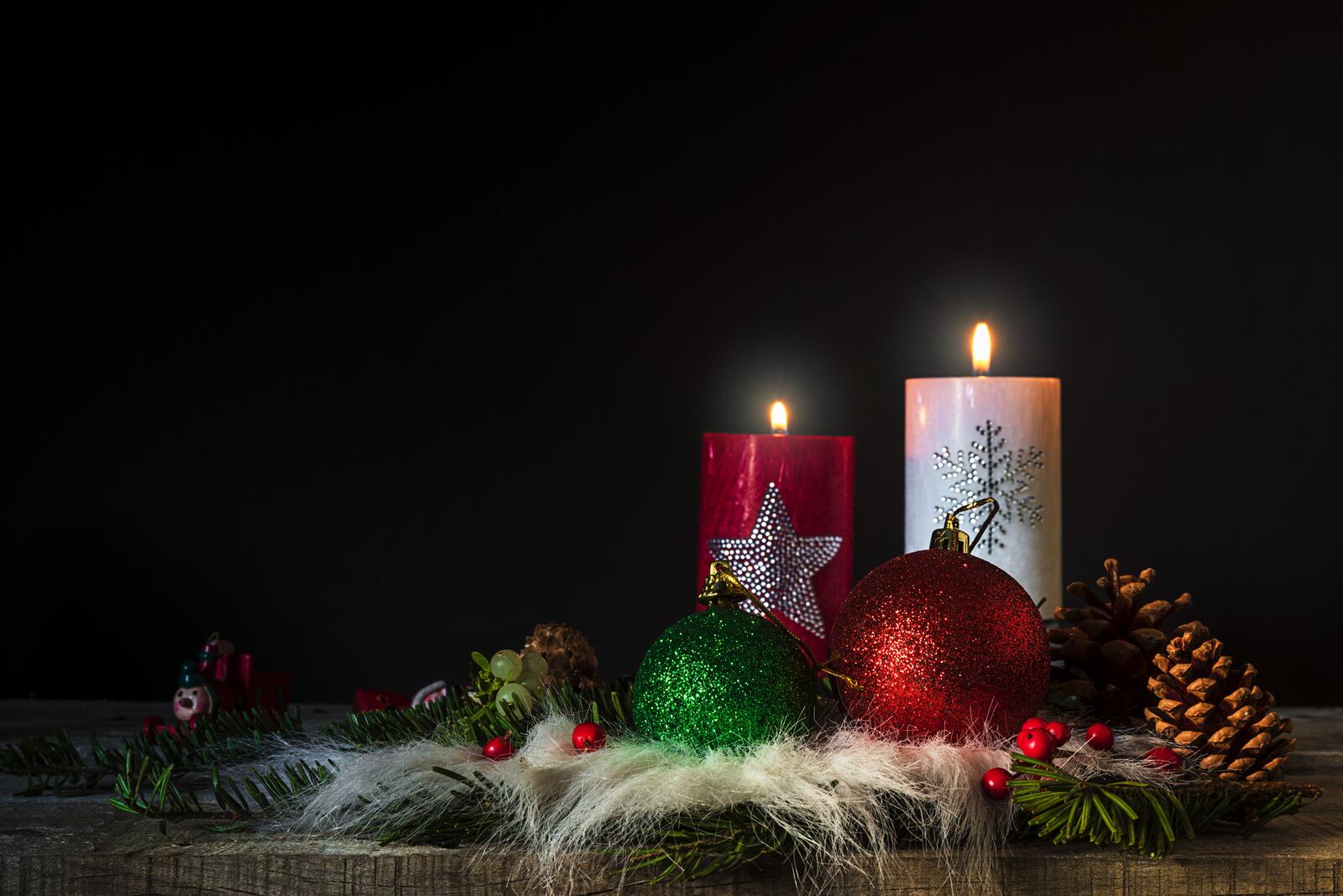 Free photo New Year`s Eve setting with toys and candles
