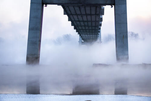 Fog under the bridge in a hard freeze