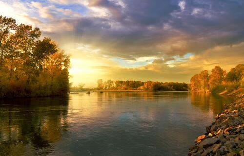 A beautiful river sunset in the fall