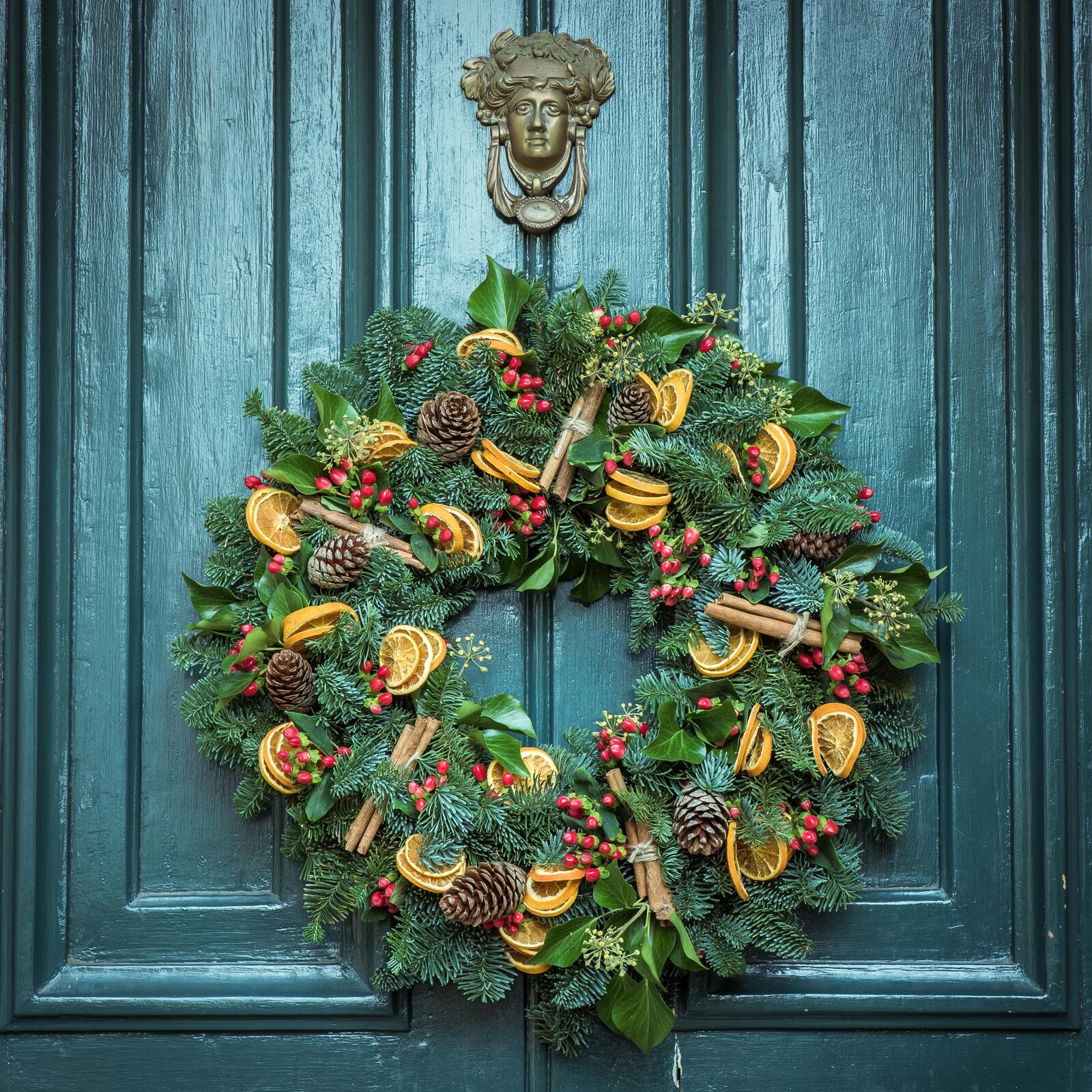 Free photo New Year`s wreath on the front door
