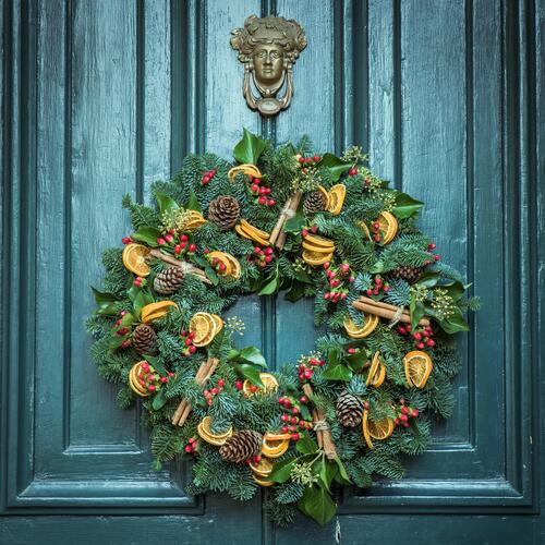 New Year`s wreath on the front door