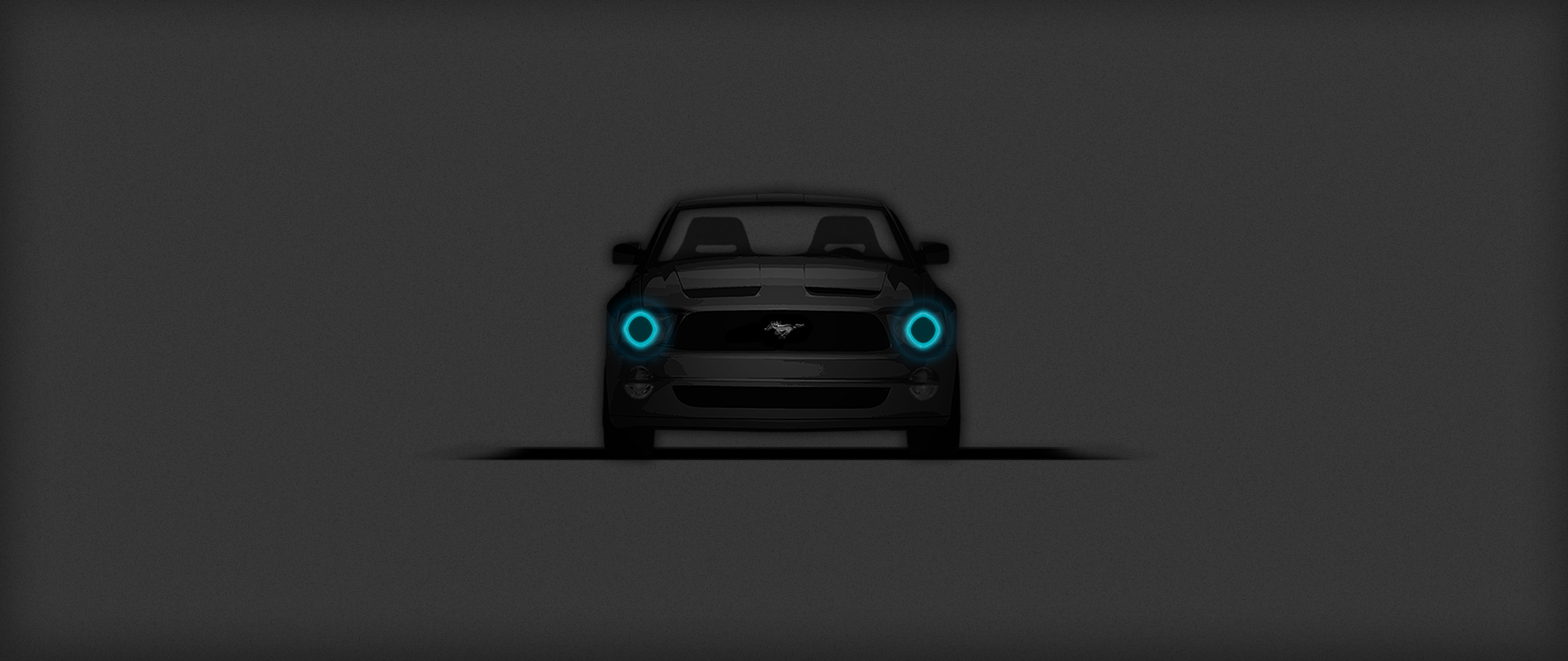 Ford Mustang silhouette with headlights on fire.